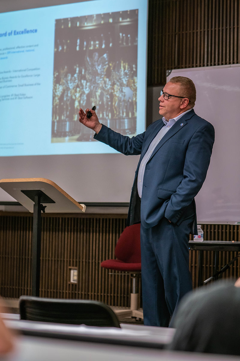 Dean Waskoviak presents to business students