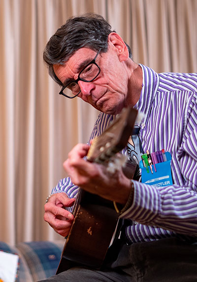 Dr Graff with guitar